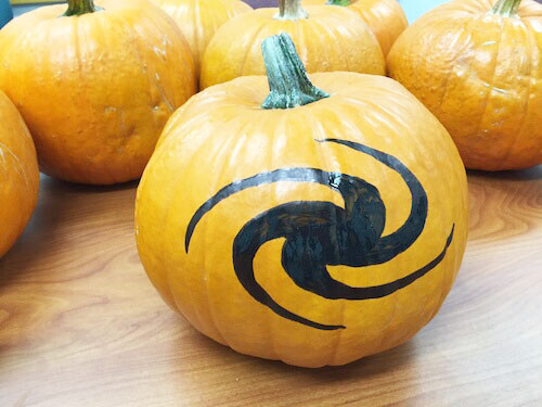 a completely filled in galaxy shape on a pumpkin