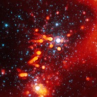 Comets? No. They are stars like our Sun, with disks of planet-making dust around them. Too bad the planet ingredients are being blasted away by radiation from bigger stars.