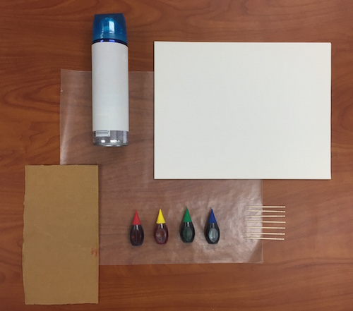 fotografía de todos los materiales necesarios para esta actividad: crema de afeitar, papel, cartón, colorante de alimentos, papel encerado y palillos de dientes